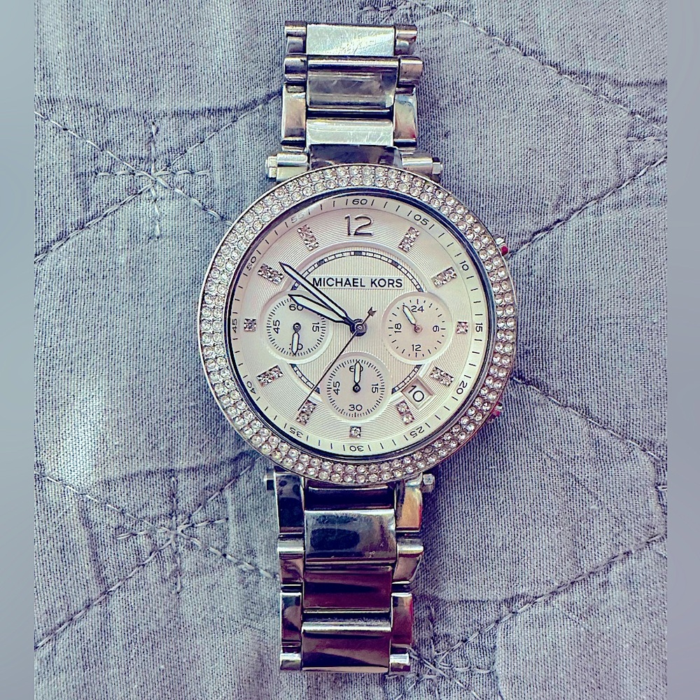 ***Michael Kors watch *** slightly used. Good condition.